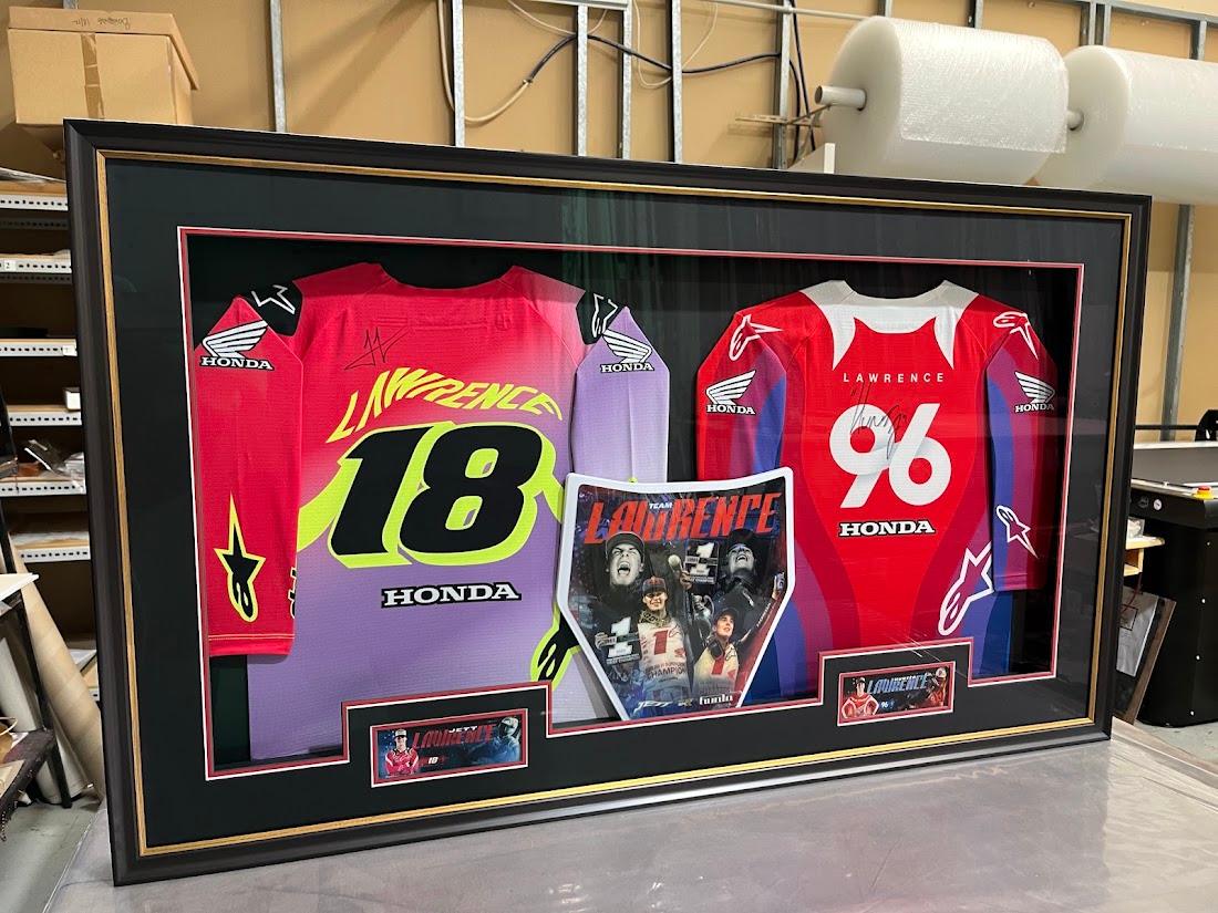 Jerseys displayed in a custom frame